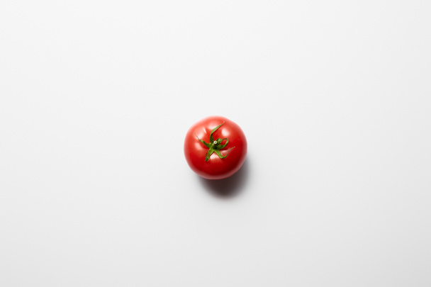 top view of red delicious ripe tomato on white background - Foto, afbeelding
