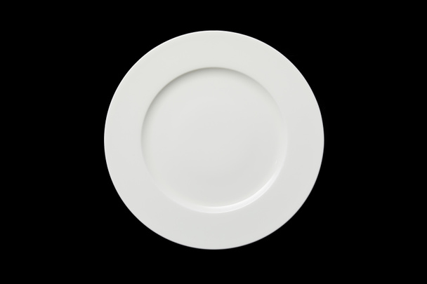 vista dall'alto del piatto rotondo vuoto bianco isolato sul nero
 - Foto, immagini