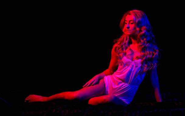 Dangerously sexy. Passion in life. Blond curly hair. Pinup look. Sexy woman in erotic lingerie. Sensual girl with fit body in red light. Fashion beauty. Pin up woman in bodysuit. feel the passion - Фото, зображення
