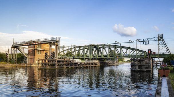 Willebroek, Belgium - May 27, 2019:  The iron swing bridge or Ijzerenbrug over the Brussels-Scheldt canal - Photo, Image