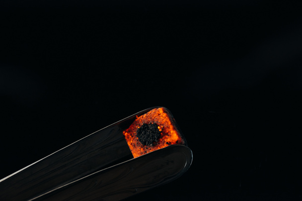 hookah tongs and hot coal isolated on black - Photo, Image