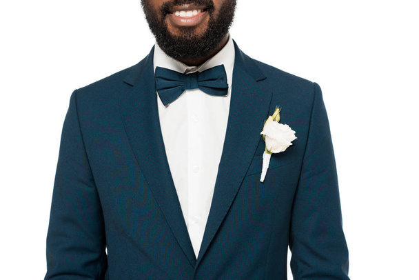 cropped view of cropped view of happy bearded african american bridegroom isolated on white  - Photo, Image