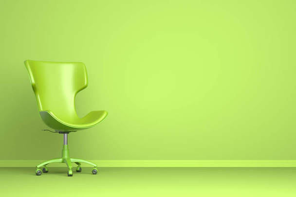 Groene stoel op de groene achtergrond - Foto, afbeelding