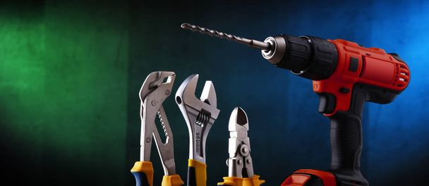  hardware tools including cordless drill and monkey spanner - Photo, Image