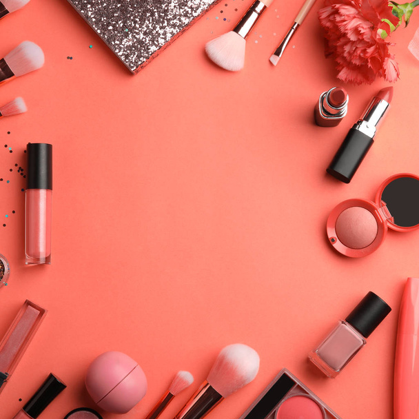 Flat lay composition with beauty accessories and space for text on coral background - Photo, Image