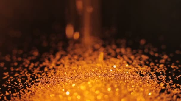 金の輝きが落ちる光沢のある輝くボケの装飾 - 映像、動画