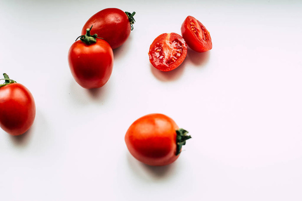 Tomatoes on a white sill - Fotoğraf, Görsel