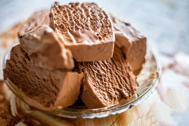 Close up of glass dish full of Chocolate chip ice cream. - Photo, image