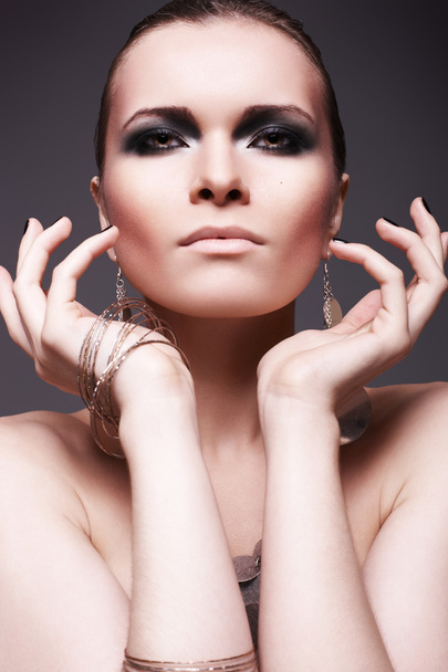 Beautiful woman with smoky eyes - Foto, afbeelding