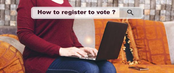 woman is browsing in the internet, and searching for how to register to vote ? - Foto, Imagen