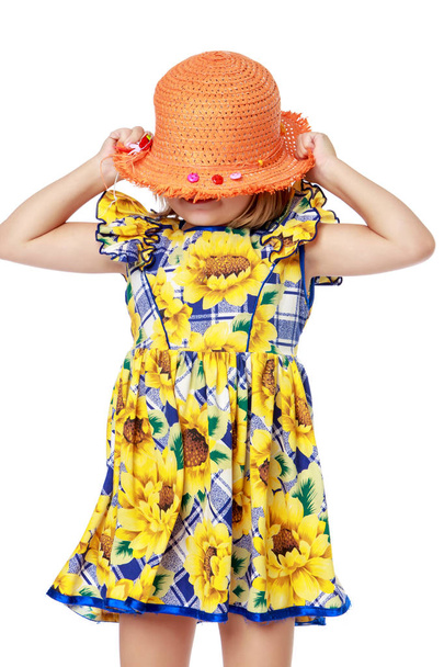 Little girl in a hat. - Фото, изображение