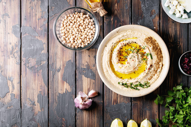 Hummus with olive oil and ground cumin - Valokuva, kuva