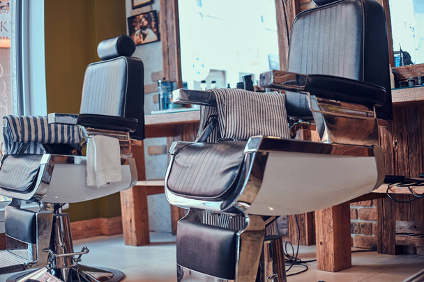 Interiour of luxury trandy barbershop in daylight. - Foto, afbeelding