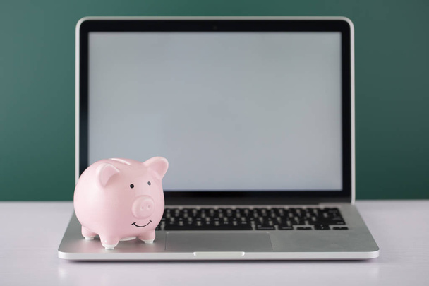 Piggy Bank With Laptop - Zdjęcie, obraz