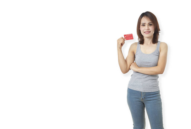 Young smiling  asian woman presenting credit card - Fotografie, Obrázek