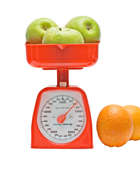 Keittiön mittakaavassa painotus omenat
 - Valokuva, kuva