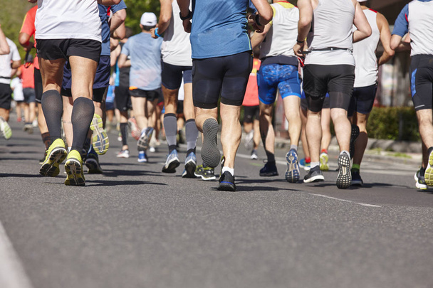 Marathon runners on the street. Healthy lifestyle. Athletes - Photo, Image