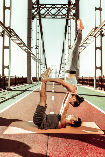 Two professional yogis exercising on a summer day - Foto, Imagem
