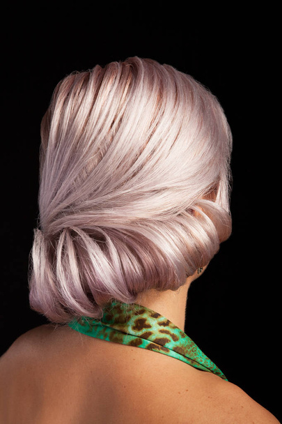 Back view of bridal coiffure on a young woman with silver hair - Photo, Image