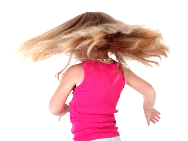 Little girl with flying hairs - 写真・画像