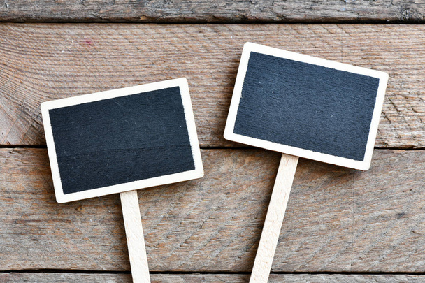 two empty chalkboards for copy space, wooden background  - Foto, Imagem