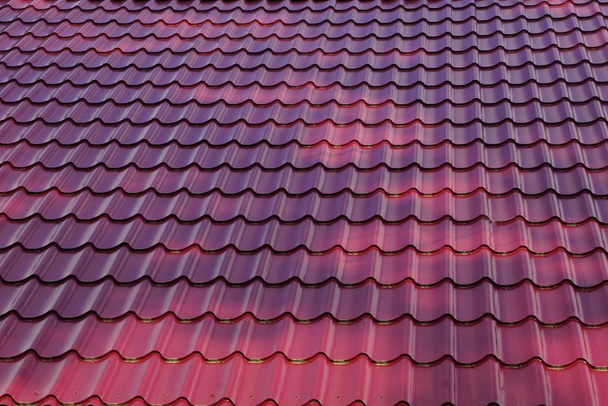 red metal texture of tiles on the roof - Photo, Image