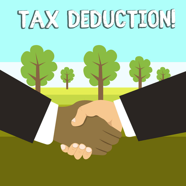 Conceptual hand writing showing Tax Deduction. Business photo showcasing amount subtracted from income before calculating tax owe Hand Shake Multiracial Male Business Partners Formal Suits. - Photo, Image