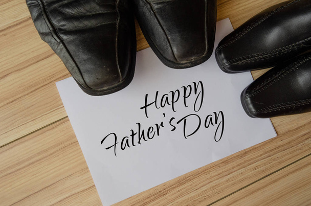 Happy fathers day, fathers shoes and baby boys shoes overhead, flat lay - Photo, Image