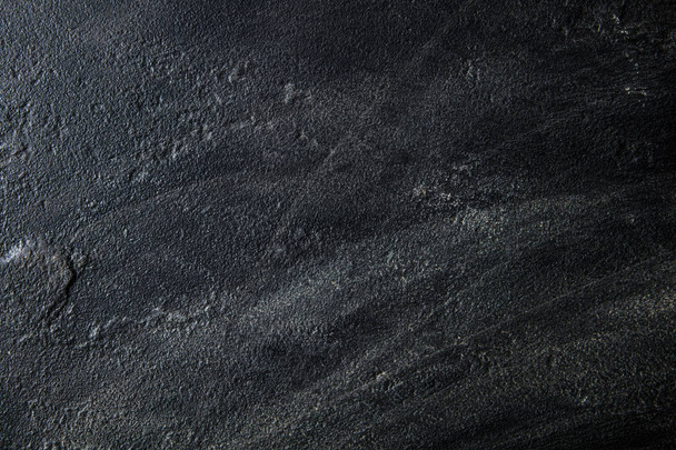 Kőfelszín. Fekete textúra kő háttér - Fotó, kép