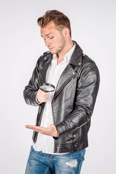 portrait of young man in black eather jacket isolated on a white - Foto, Imagem