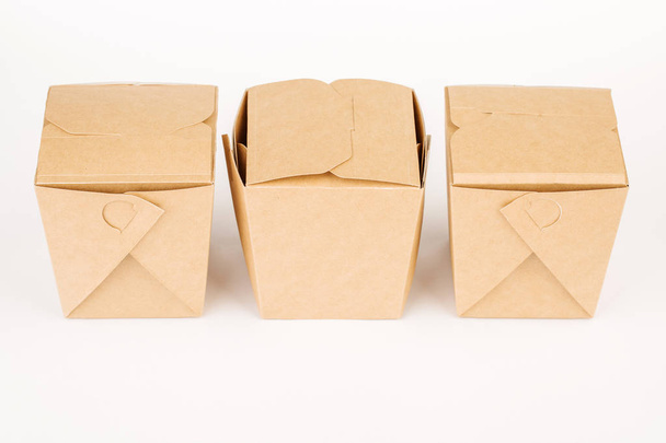 Three WOK paper boxes. Asian fast food concept. - Foto, Imagen
