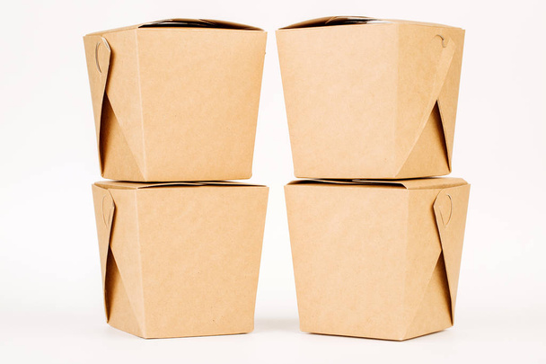 Four WOK paper boxes. Asian fast food concept. - Fotó, kép