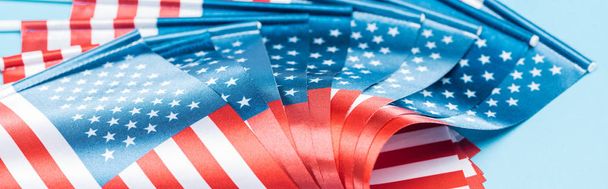 close up view of glossy american flags, panoramic shot - Photo, Image