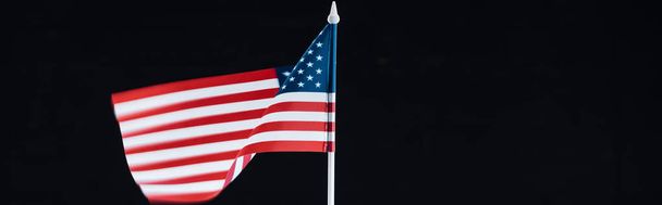 panoramic shot of national american flag on stick isolated on black with copy space - Photo, Image