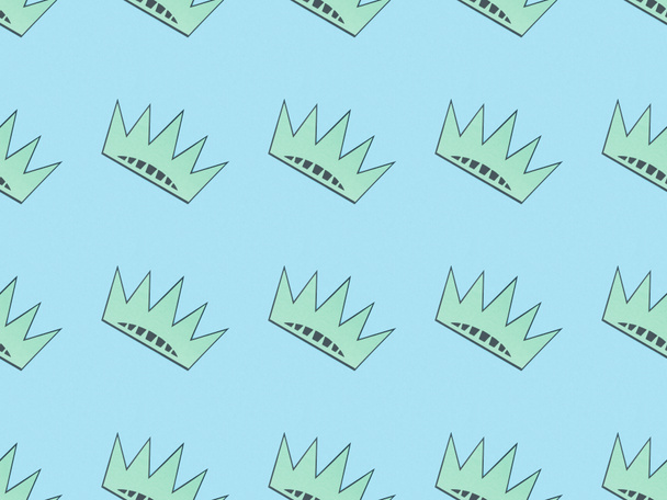 seamless background pattern with turquoise crowns on blue, Independence Day concept - Foto, Imagen