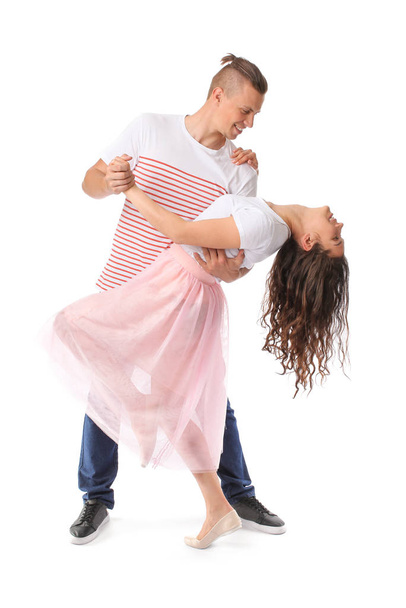 Dançando jovem casal no fundo branco
 - Foto, Imagem