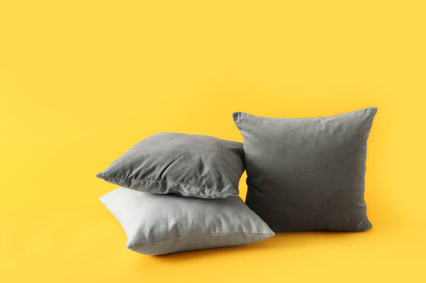Soft pillows on color background - Photo, Image