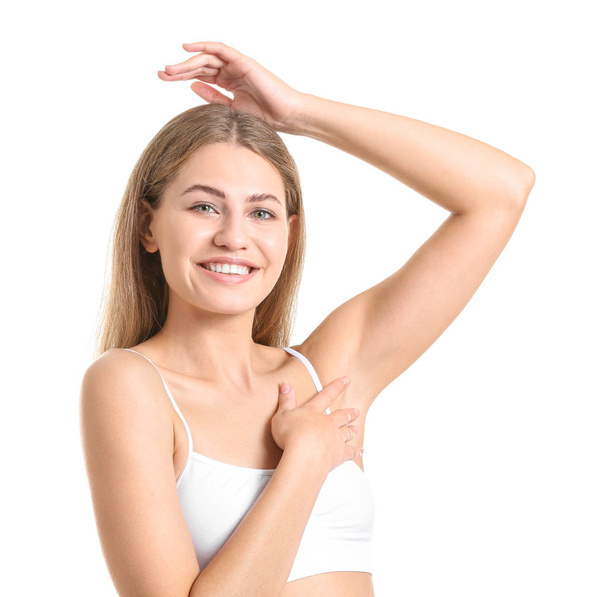 Beautiful young woman with smooth skin after depilation on white background - Foto, Imagem