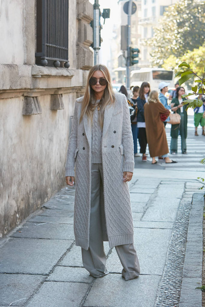 Nina Suess with with long wool beige coat and sunglasses before Max Mara fashion show, Milan Fashion Week street style on September 21, 2017 in Milan. - Photo, image