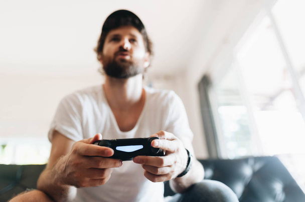 A man playing video games - 写真・画像
