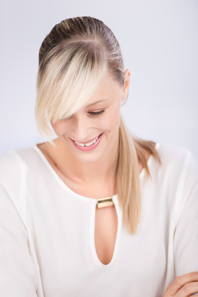 Smiling blond female - Fotografie, Obrázek