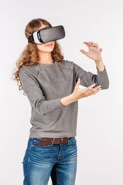 Woman watching with VR device - Foto, Imagen