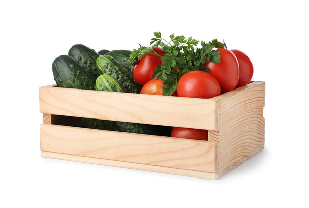 Wooden crate full of fresh vegetables on white background - Foto, immagini