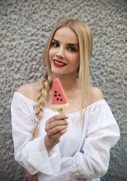 Portrait of young woman with ice cream  - Zdjęcie, obraz