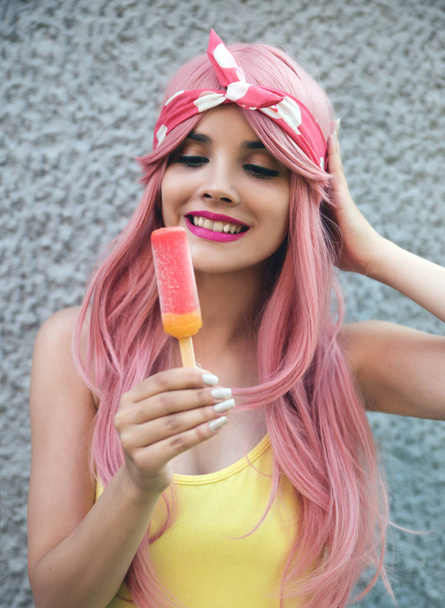 Portrait of young woman with ice cream  - 写真・画像