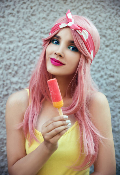 Portrait of young woman with ice cream  - Valokuva, kuva