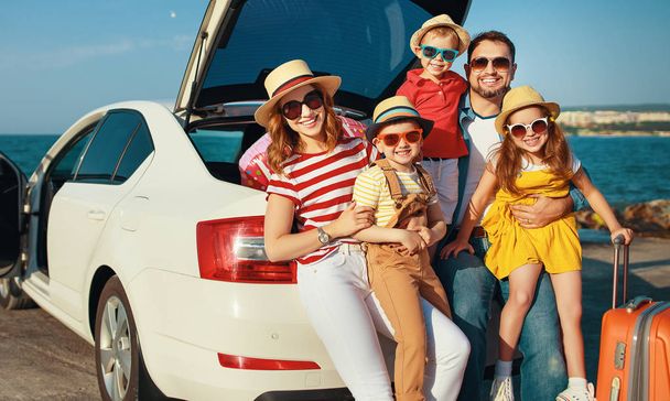 happy large family  in summer auto journey travel by car on beac - Valokuva, kuva