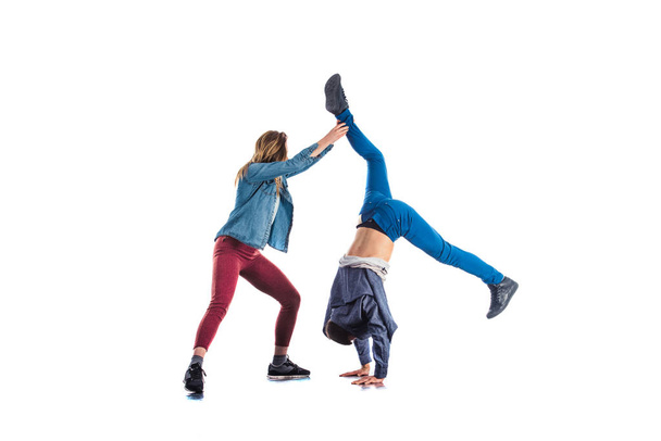 Dwa męskie i żeńskie ćwiczenia razem Handstand - Zdjęcie, obraz