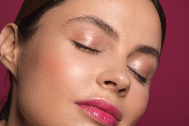 Woman with pink lips closing her eyes and smiling - Photo, Image
