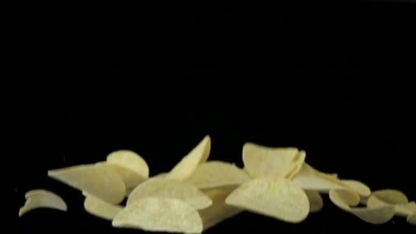 Patatas fritas cayendo en cámara lenta
 - Metraje, vídeo